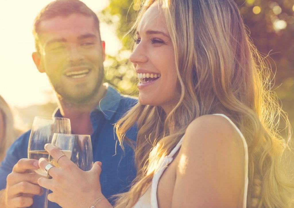 Man and woman enjoying a drink