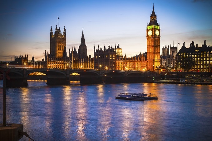 The Palace of Westminster from Thames river at dusk
